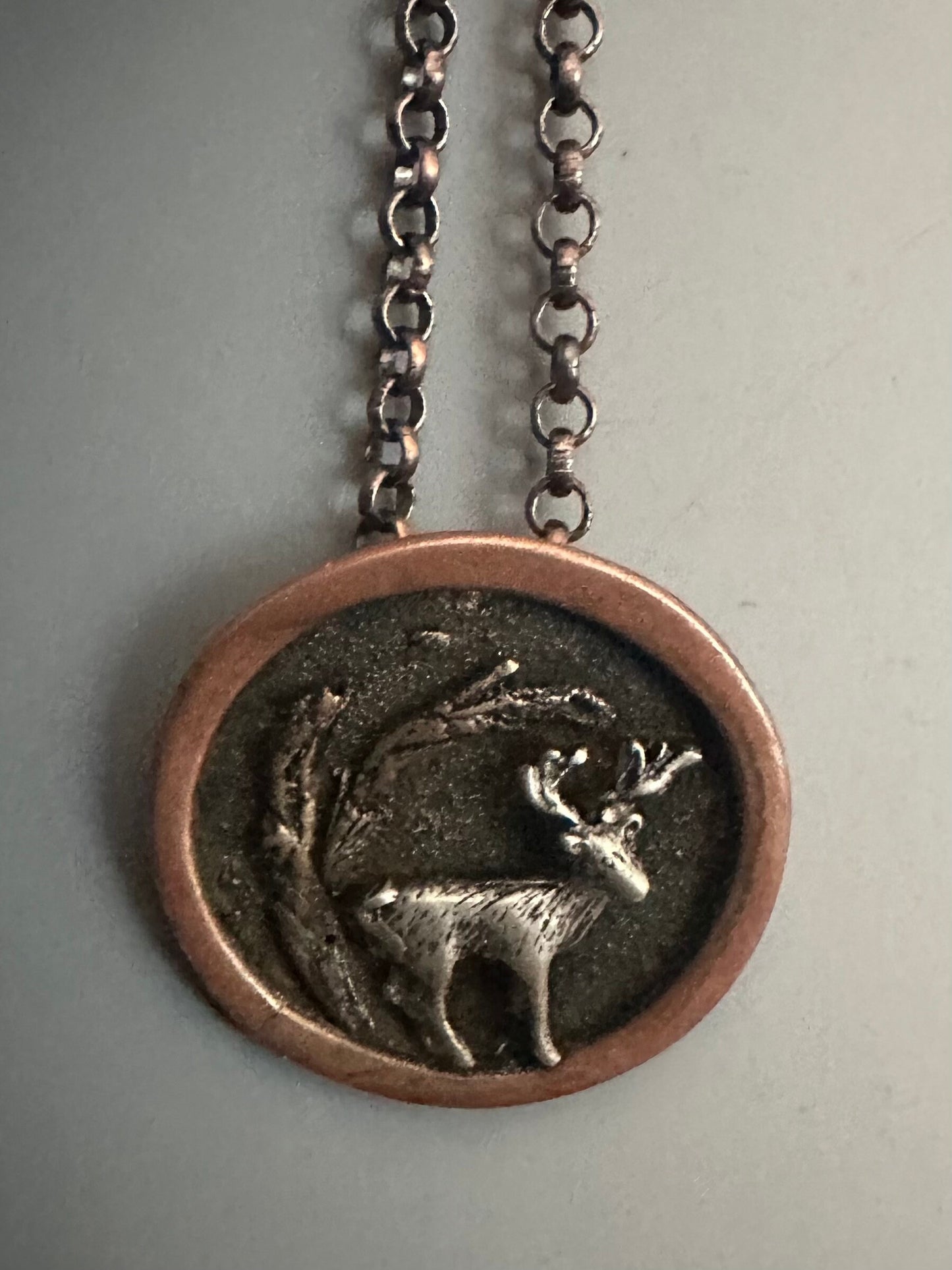 Handmade deer in woods tri metal necklace