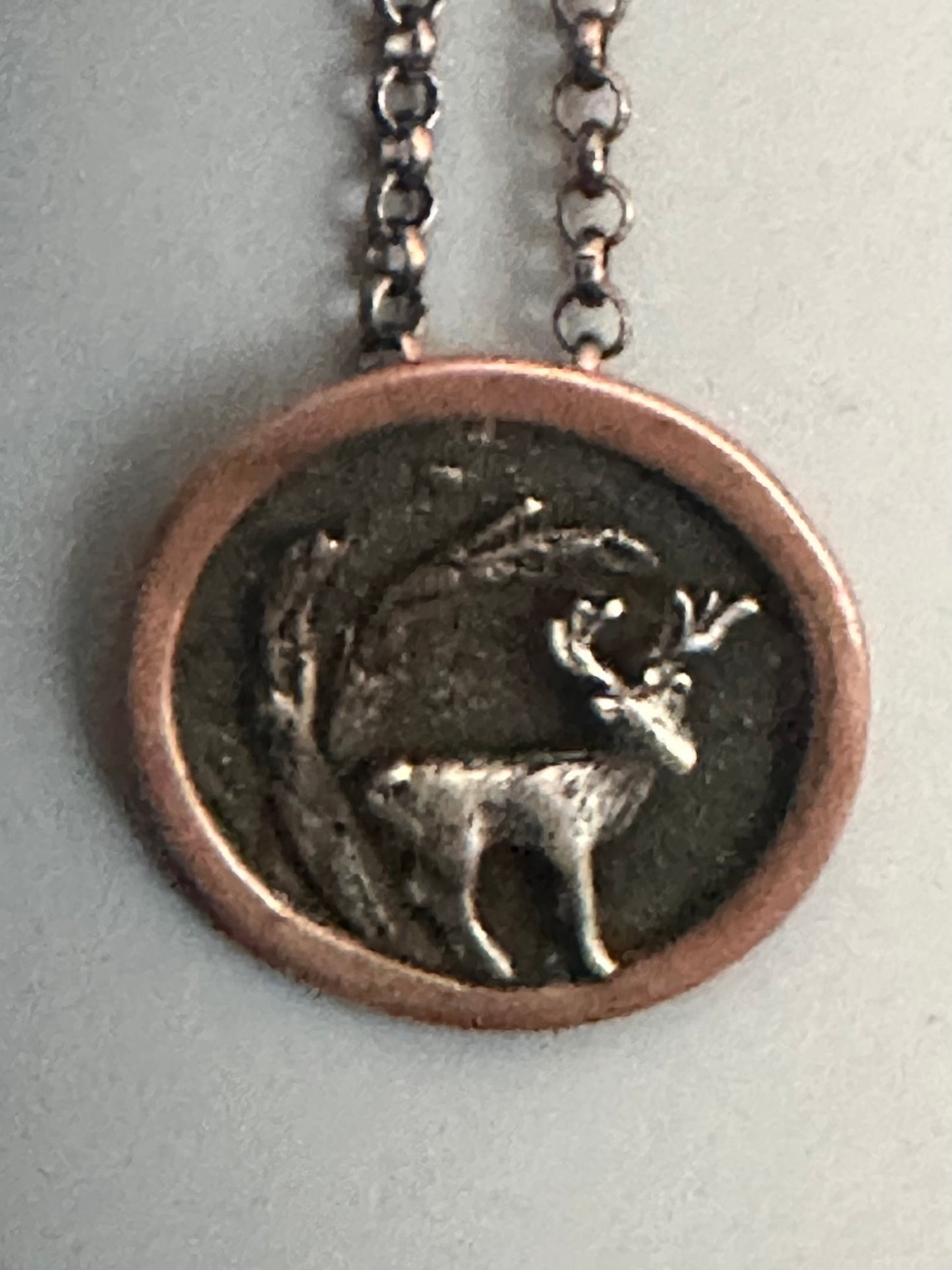 Handmade deer in woods tri metal necklace