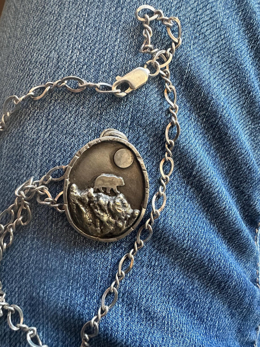Bear in mountains hand forged silver necklace