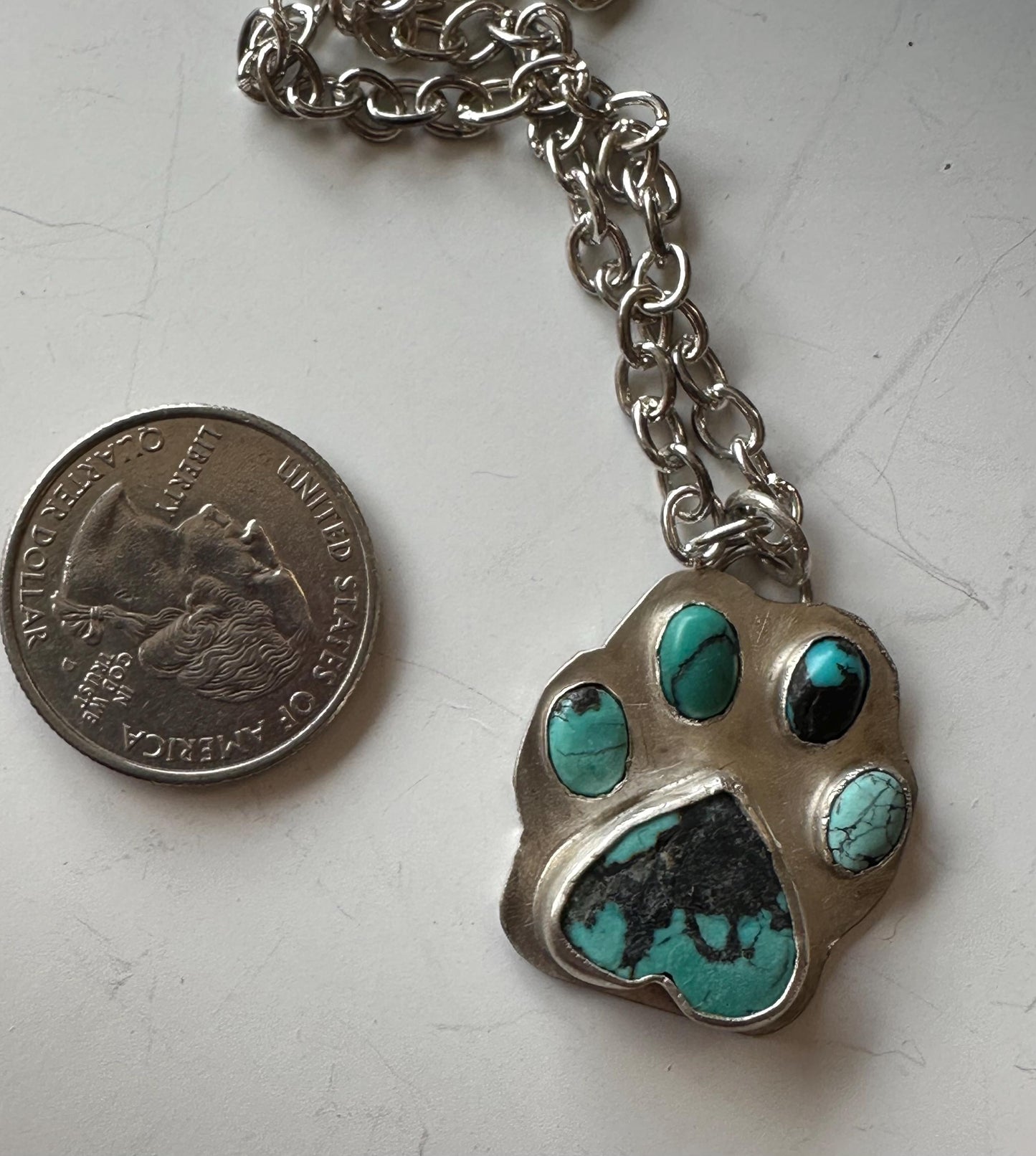 Turquoise paw print necklae