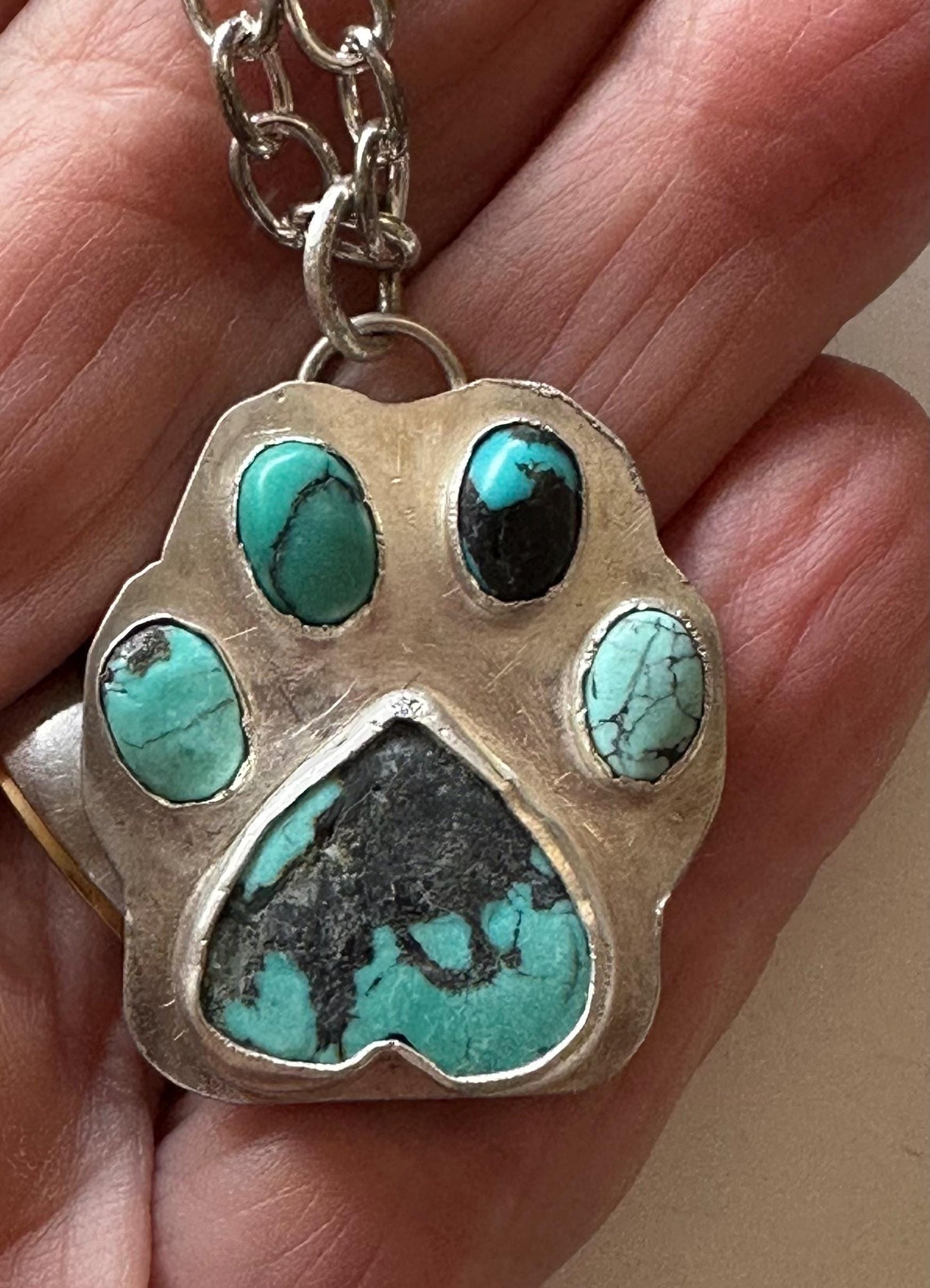 Turquoise paw print necklae