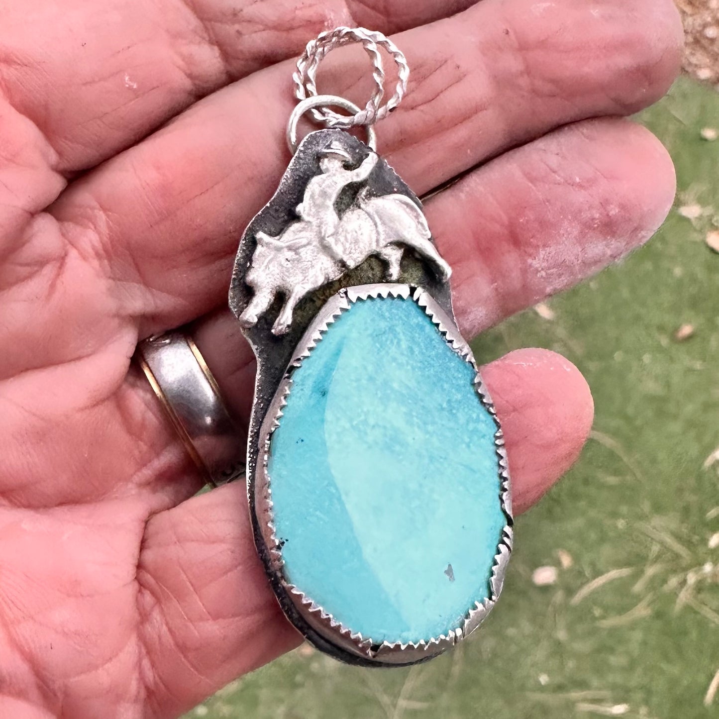 Ride the Spirit of the West – Handcrafted Bull Rider Turquoise Pendant