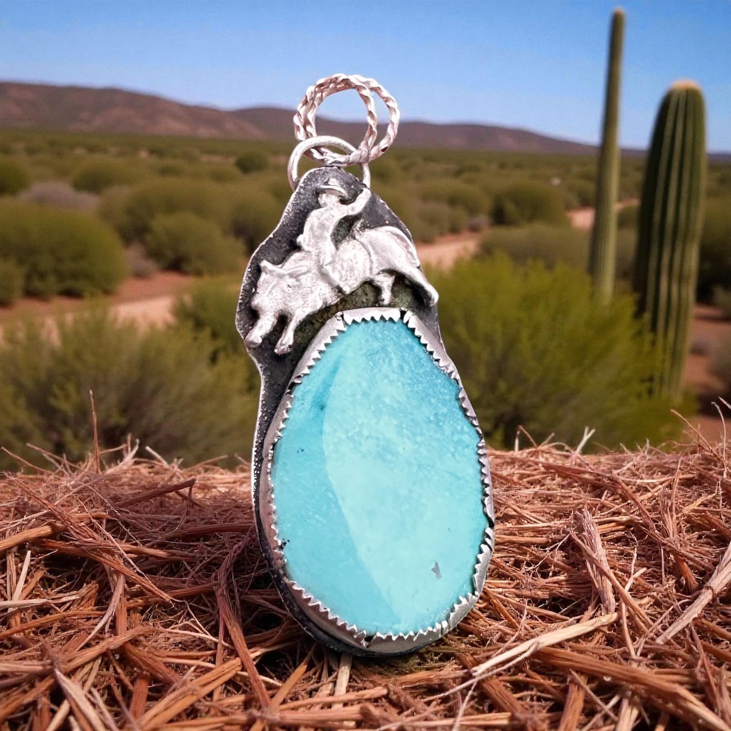 Ride the Spirit of the West – Handcrafted Bull Rider Turquoise Pendant